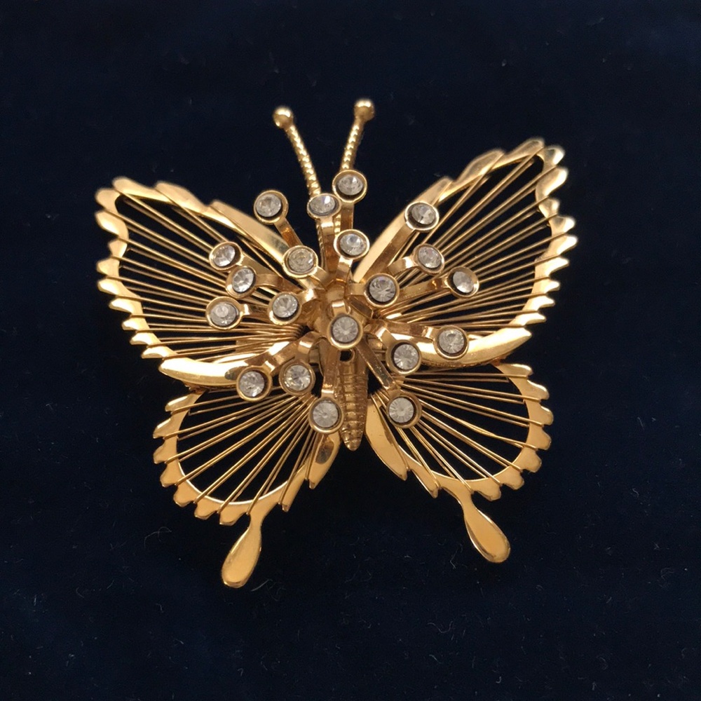 Vintage Monet Gold Tone 3D Butterfly Brooch with Crystal Clear Rhinestones.